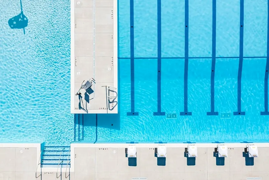 An aerial view of lap lanes and starting blocks